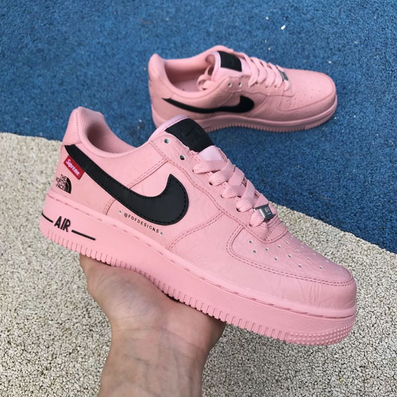 Supreme The North Face Nike Air Force 1 Sup AF1 Low "Pink Black" AR3066-800 In Hand Lateral Supreme The North Face Nike Air Force 1 Sup AF1 Low "Pink Black" AR3066-800 In Hand Lateral